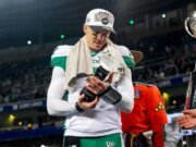Como os prêmios de Jogador Mais Valioso e Canadense Mais Valioso da Grey Cup são decididos