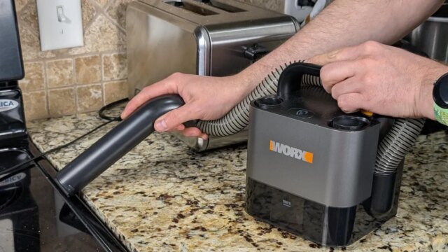 worx-cube-vac-handheld-vacuum-cleaning-crumbs-in-the-kitchen-1.jpg