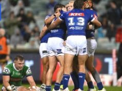 Cães seguram Canberra em batalha brutal em tempo chuvoso