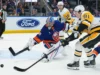 Os pinguins atacam os Islanders para vencer um grande jogo na corrida dos playoffs do Leste