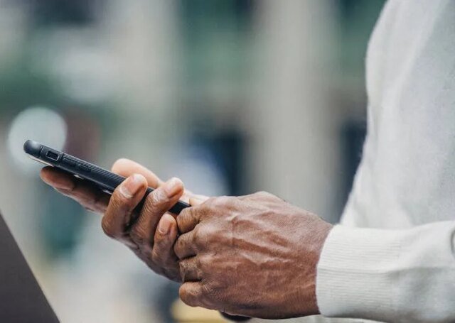 person-using-phone.jpeg