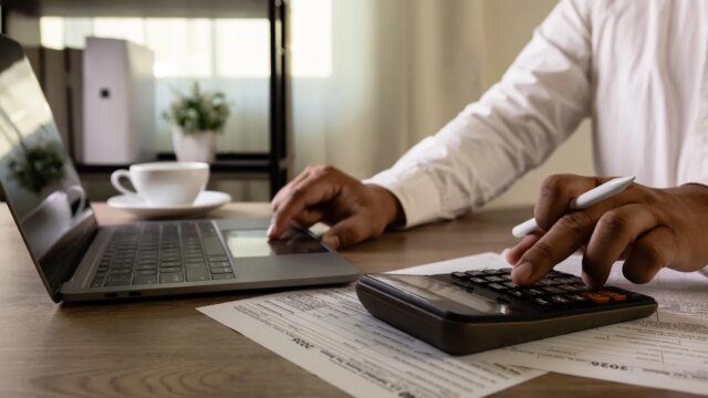 taxes-laptop-calculator-gettyimages-2261240365.jpg
