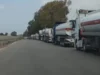 Comboio de caminhões de petróleo mostra a Síria devastada pela guerra se vendendo como um corredor seguro em meio ao conflito regional