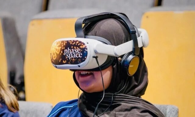 girl-using-vr-headset-on-chair.jpeg