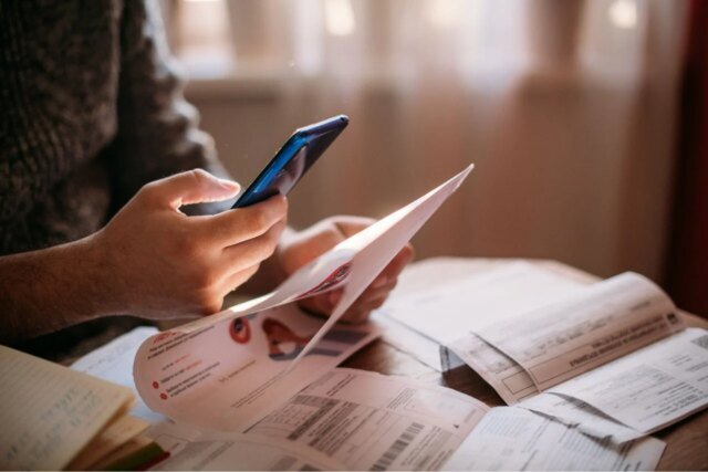 person-paying-bills-1280x853.jpg